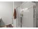 Modern bathroom features a glass shower enclosure with white tiling and a built-in shelf at 223 Goshen Rd, Moncks Corner, SC 29461