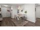 Bright dining area featuring an area rug, with a contemporary chandelier at 223 Goshen Rd, Moncks Corner, SC 29461