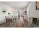 Open dining area with modern chandelier and view into the connected living spaces at 223 Goshen Rd, Moncks Corner, SC 29461