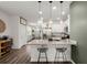 Modern kitchen with stainless steel appliances, granite countertops, and pendant lighting at 223 Goshen Rd, Moncks Corner, SC 29461