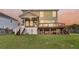 Inviting backyard features a screened porch and a deck, perfect for outdoor entertaining and relaxation at 2242 Terrabrook Ln, Charleston, SC 29412