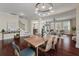 Open-concept dining area flows into a living room, creating a bright and inviting living space at 2242 Terrabrook Ln, Charleston, SC 29412