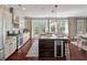 Bright kitchen with stainless steel appliances, granite countertops, and an island with seating at 2242 Terrabrook Ln, Charleston, SC 29412