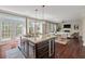 Gourmet kitchen with granite countertops, stainless steel appliances, and an open layout connecting to the living room at 2242 Terrabrook Ln, Charleston, SC 29412