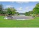 Scenic outdoor amphitheater overlooking a serene lake, ideal for community events and gatherings at 227 Oak View Way, Summerville, SC 29483