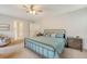 Bright bedroom showcases bed with stylish pillows and a ceiling fan with ample natural light at 227 Oak View Way, Summerville, SC 29483