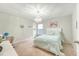 Cozy bedroom with carpet flooring, a chandelier, and a bed with light blue bedding at 227 Oak View Way, Summerville, SC 29483