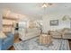 Open-concept living room with hardwood floors and comfortable seating arrangements at 227 Oak View Way, Summerville, SC 29483