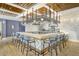Stylish bar area with ample seating, modern lighting, and a variety of beverage options at 26 Edgewater Aly, Isle of Palms, SC 29451
