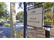 Sign for bike rentals at Wild Dunes near pathway and palm trees on sunny day at 26 Edgewater Aly, Isle of Palms, SC 29451