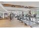 Spacious gym with multiple treadmills, elliptical machines, and weight equipment for a comprehensive workout at 26 Edgewater Aly, Isle of Palms, SC 29451