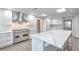 Bright, spacious kitchen features a large island, modern appliances, and ample storage at 26 Edgewater Aly, Isle of Palms, SC 29451