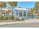 Charming restaurant with covered outdoor seating, perfect for enjoying meals in a relaxed and sunny atmosphere at 26 Edgewater Aly, Isle of Palms, SC 29451