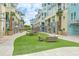 The town center features outdoor seating, lush greenery and a pathway leading to shops and restaurants at 26 Edgewater Aly, Isle of Palms, SC 29451