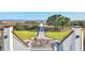 View of a picturesque beach walkway leading to ocean, from staircase with white railings at 26 Edgewater Aly, Isle of Palms, SC 29451