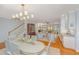 Open dining area next to the living room and kitchen at 2629 Goldbug Ave, Sullivans Island, SC 29482