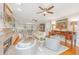 Spacious living room featuring hardwood floors, neutral paint, and stylish furnishings at 2629 Goldbug Ave, Sullivans Island, SC 29482