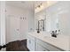 A modern bathroom with double sinks, black fixtures, and a glass-enclosed shower exudes luxury at 265 Lucca Dr, Summerville, SC 29486
