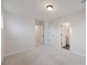 Neutral bedroom offering plush carpeting with a door leading to an en suite bathroom at 265 Lucca Dr, Summerville, SC 29486