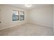 Sunlit bedroom with plush carpeting and window overlooking the outdoors at 265 Lucca Dr, Summerville, SC 29486