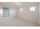 Bright bedroom with neutral carpet, two windows, and natural light at 265 Lucca Dr, Summerville, SC 29486