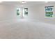 Bright bonus room with neutral carpet, recessed lights and large windows offering backyard views at 265 Lucca Dr, Summerville, SC 29486