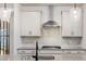 Close-up of the kitchen featuring granite countertops, stainless steel appliances, tile backsplash, and pendant lighting at 265 Lucca Dr, Summerville, SC 29486