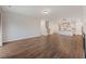 A cozy open-concept living space with hardwood floors and access to the kitchen at 265 Lucca Dr, Summerville, SC 29486