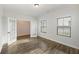 Office space with windows, white French doors, and wood floors at 265 Lucca Dr, Summerville, SC 29486