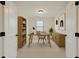Simple and modern office space featuring a wooden desk, comfortable chair, and stylish decor at 265 Lucca Dr, Summerville, SC 29486