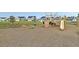 Community playground with unique pirate ship structure, spring riders, and slide for enjoyment at 265 Lucca Dr, Summerville, SC 29486