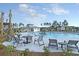 Community pool with lounge chairs and clubhouse, perfect for relaxation and socializing at 265 Lucca Dr, Summerville, SC 29486