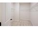 A well-organized walk-in closet with white shelving provides ample storage and convenience at 265 Lucca Dr, Summerville, SC 29486
