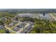 Breathtaking aerial view of a lakeside community featuring a variety of colorful homes surrounded by nature at 2743 Calico Bass Ln, Johns Island, SC 29455