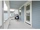 Inviting balcony space with egg chair and outdoor seating near the door at 2743 Calico Bass Ln, Johns Island, SC 29455