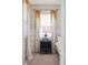 Well-lit bedroom featuring stylish decor and a nightstand with a decorative lamp at 2743 Calico Bass Ln, Johns Island, SC 29455