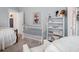Charming Bedroom with crib, chair, soft colors and playful decorations at 2743 Calico Bass Ln, Johns Island, SC 29455