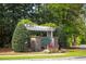 Inviting entrance to The Gardens of Whitney Lake, featuring a brick sign and lush landscaping at 2743 Calico Bass Ln, Johns Island, SC 29455
