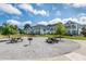 Inviting community park with picnic tables and barbecue grill, perfect for outdoor gatherings and relaxation at 2743 Calico Bass Ln, Johns Island, SC 29455