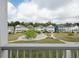 Scenic view of well-maintained homes surrounded by lush greenery and walkways at 2743 Calico Bass Ln, Johns Island, SC 29455