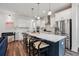 Modern kitchen with stainless steel appliances, stylish island and barstool seating at 2743 Calico Bass Ln, Johns Island, SC 29455