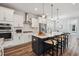 Chic kitchen with white cabinets, a large island, and stainless steel appliances at 2743 Calico Bass Ln, Johns Island, SC 29455