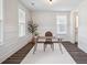 Bright office space with natural light, wainscoting, and wood floors, creates a productive and inviting work environment at 2743 Calico Bass Ln, Johns Island, SC 29455