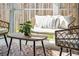Inviting screened patio with cozy seating and decorative rug, perfect for outdoor relaxation and entertaining at 2743 Calico Bass Ln, Johns Island, SC 29455