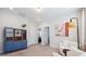 Cozy sitting room with a vintage display cabinet, modern chairs, and neutral decor at 2743 Calico Bass Ln, Johns Island, SC 29455