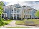 Charming multi-colored homes with welcoming front porches, creating a warm and inviting neighborhood atmosphere at 2743 Calico Bass Ln, Johns Island, SC 29455