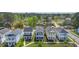Charming street view showcasing colorful homes with inviting front porches and well-manicured lawns at 2743 Calico Bass Ln, Johns Island, SC 29455