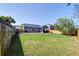 Large, private backyard with lush lawn and mature trees, perfect for outdoor activities at 2914 Glenarden Dr, Charleston, SC 29414