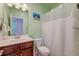 Fresh bathroom featuring a single sink vanity, toilet, and shower with curtain at 2914 Glenarden Dr, Charleston, SC 29414