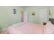 Bright bedroom featuring a cozy bed, soft carpet, and a nearby closet at 2914 Glenarden Dr, Charleston, SC 29414